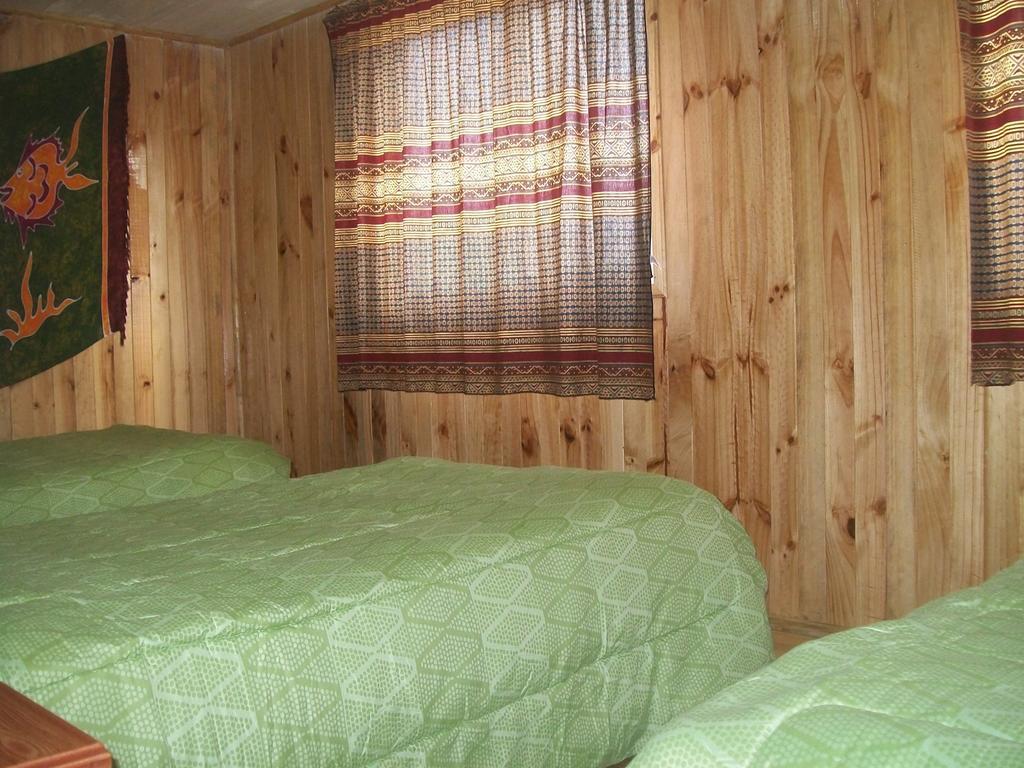 Hostal Austral Ancud Quarto foto