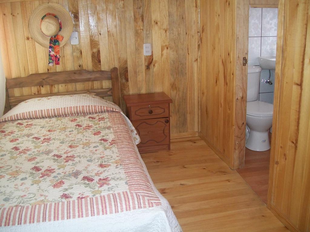 Hostal Austral Ancud Quarto foto