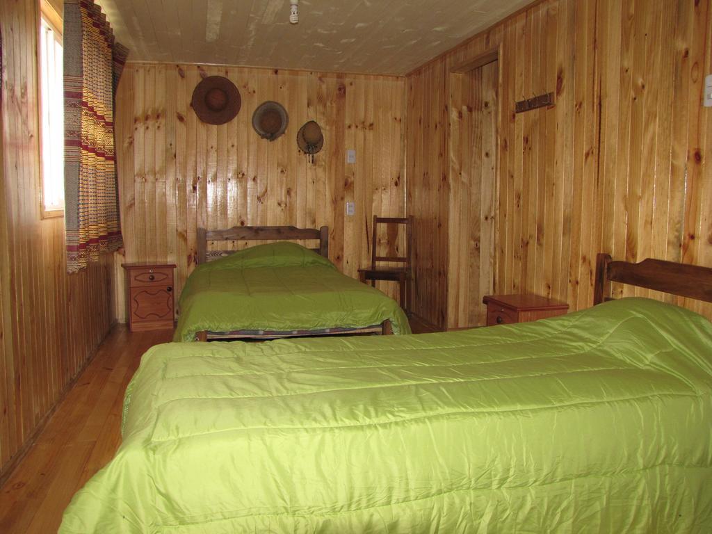 Hostal Austral Ancud Quarto foto